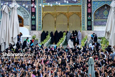 آئین اذن عزای حسینی و تعویض پرچم گنبد حرم مطهر رضوی