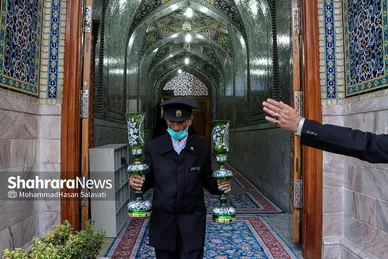 آئین اذن عزای حسینی و تعویض پرچم گنبد حرم مطهر رضوی