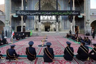 آیین تعویض پرچم گنبد حرم حضرت معصومه(س)