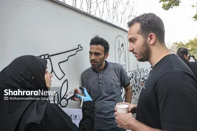 گزارش تصویری | اجرای دیوار نگاره «قوموا لله» با حضور هنرمندان بین المللی در مشهد