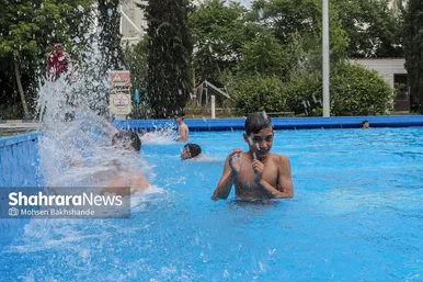 عکس‌هایی از استخر روباز پارک ملت