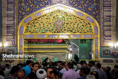 مراسم تعویض پرچم گنبد و پوش ضریح حرم مطهر ثامن الحجج (ع)