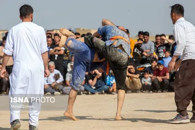 مسابقات کشتی سنتی افغانستانی‌ها به مناسبت نوروز در قم
