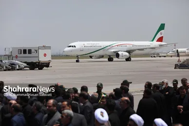 عکس‌هایی از مراسم استقبال از پیکر مطهر رئیس‌جمهور شهید در فرودگاه مشهد