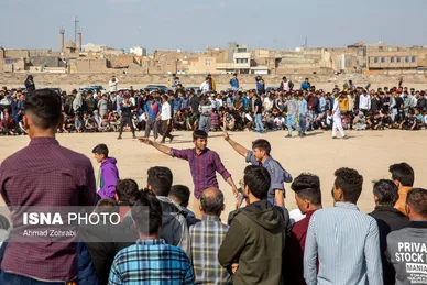 مسابقات کشتی سنتی افغانستانی‌ها به مناسبت نوروز در قم