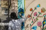 مشهد با نصب نماد‌ها و نشانه‌های هنری برای نوروز ۱۴۰۰ آماده می‌شود + تصاویر