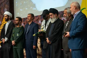 تکریم مجاهدت&zwnj;های لشکر فاطمیون با حضور نمایندگان ۷۰ کشور دنیا+ عکس