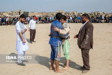 مسابقات کشتی سنتی افغانستانی‌ها به مناسبت نوروز در قم