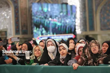 مراسم تعویض پرچم گنبد و پوش ضریح حرم مطهر ثامن الحجج (ع)
