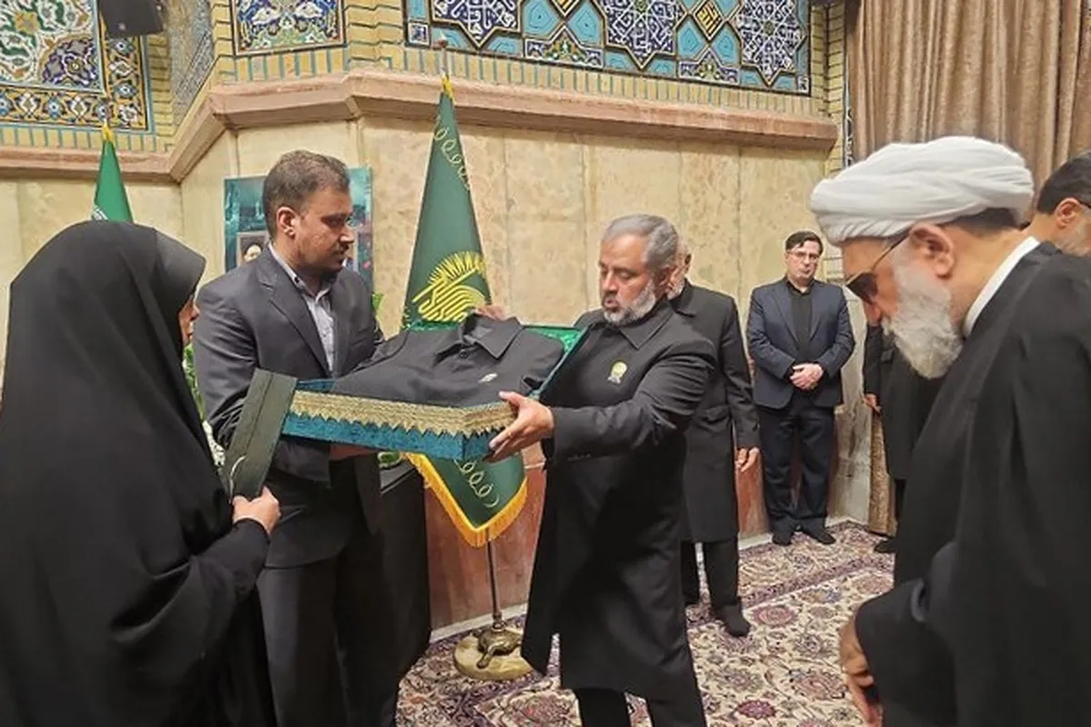 پرچم متبرک حرم امام رضا(ع) در مراسم تشییع شهید امیرعبداللهیان + فیلم