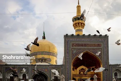 آئین اذن عزای حسینی و تعویض پرچم گنبد حرم مطهر رضوی