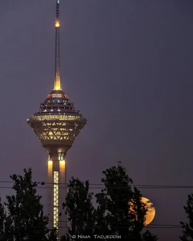 تصاویری از ابر ماه آبی زیبا در دل آسمان شب