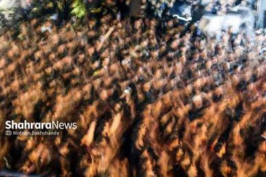 عکس‌هایی از مراسم علم کشیِ مهاجران افغانستانی در گلشهر مشهد