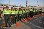 پاکبان‌های مشهدی، خیابان‌های نجف را رفت و روب می‌کنند