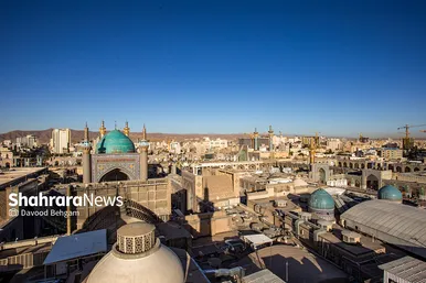 آیین تعویض پرچم گنبد منور حرم مطهر رضوی