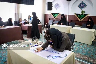 گزارش تصویری | پویش مردمی پلاکاردنویسی «باید برخاست»