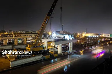 اجرای عملیات تیرگذاری دوربرگردان شهید میرزایی مشهد زیر باران پاییزی