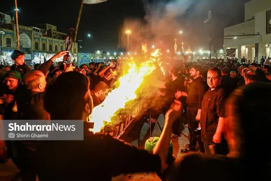 گزارش تصویری | آیین مشعل گردانی نجفی های مقیم مشهد در شب عاشورا