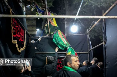 مراسم «علم کشی» مهاجران افغانستانی در مشهد
