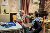 خدمت امدادگران هلال احمر مشهد در  قلب نجف + عکس