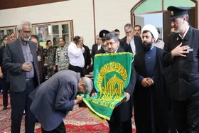 حضور خدام رضوی با پرچم متبرک در اجتماع مردمی تهران + فیلم