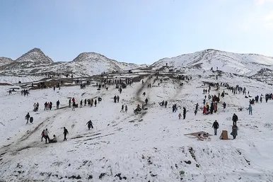 بازی و شادی مردم مشهد پس از روز برفی