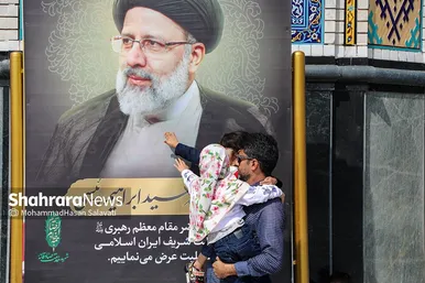مجموعه عکس | تعویض پرچم گنبد مطهر رضوی به احترام شهادت رئیس جمهور و هیئت همراه