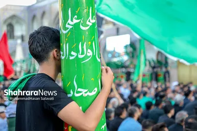 آئین اذن عزای حسینی و تعویض پرچم گنبد حرم مطهر رضوی