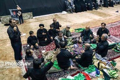 مراسم «علم کشی» مهاجران افغانستانی در مشهد