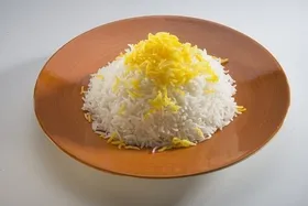کدام ادویه&zwnj;ها، طبع سرد برنج را در هنگام پخت از بین می&zwnj;برند؟