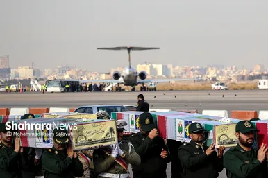 استقبال از پیکر مطهر ۱۲ شهید گمنام دفاع مقدس در فرودگاه هاشمی نژاد مشهد