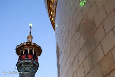 آیین تعویض پرچم گنبد حرم حضرت معصومه(س)
