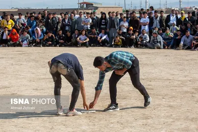 مسابقات کشتی سنتی افغانستانی‌ها به مناسبت نوروز در قم