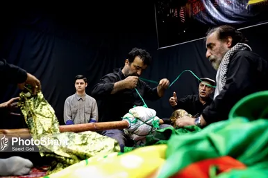 مراسم «علم کشی» مهاجران افغانستانی در مشهد