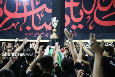 گزارش تصویری | مراسم علم کشیِ مهاجران افغانستانی در گلشهر مشهد