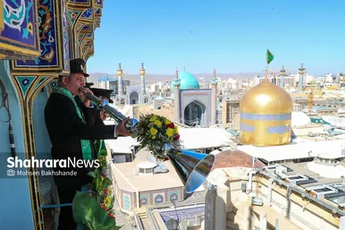 مراسم تعویض پرچم گنبد و پوش ضریح حرم مطهر ثامن الحجج (ع)