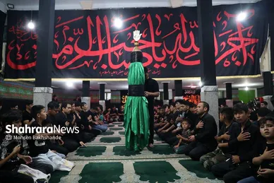 عکس‌هایی از مراسم علم کشیِ مهاجران افغانستانی در گلشهر مشهد