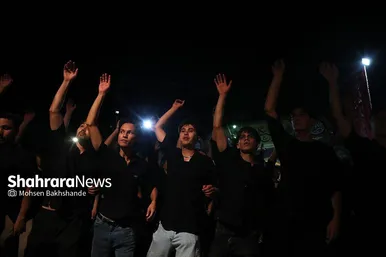 عکس‌هایی از مراسم علم کشیِ مهاجران افغانستانی در گلشهر مشهد