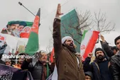 تجمع مهاجران افغانستانی در محکومیت جنایات آمریکایی - صهیونیستی علیه ایران، مقابل دفتر سازمان ملل در مشهد + فیلم