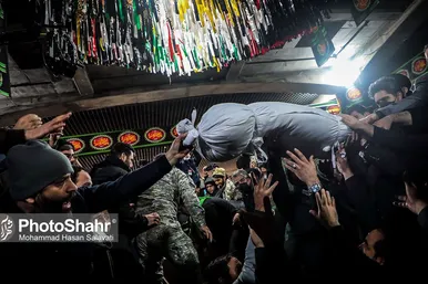 مراسم تدفین پیکر مطهر سه شهید گمنام در میدان شهدا مشهد